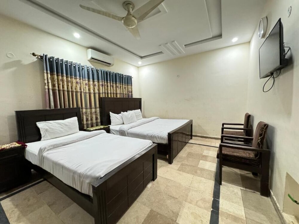 Millat Guest House G9 4
