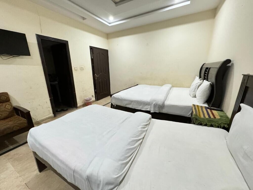 Millat Guest House G9 4