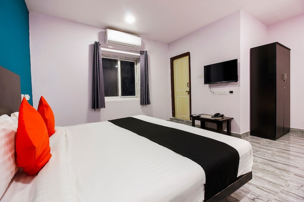 Capital O Che Sigma Hotel