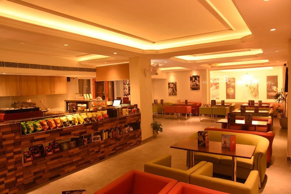The Gulmohar Grand Hotel 