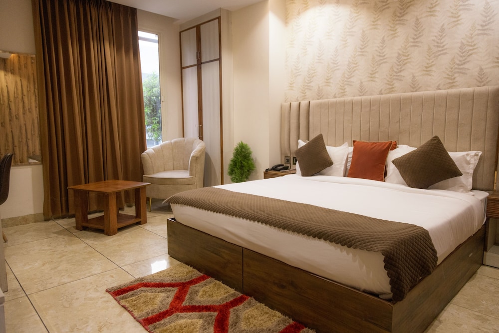 The Eminence Hotel @ 1 min drive from Max Hospital, Mohali