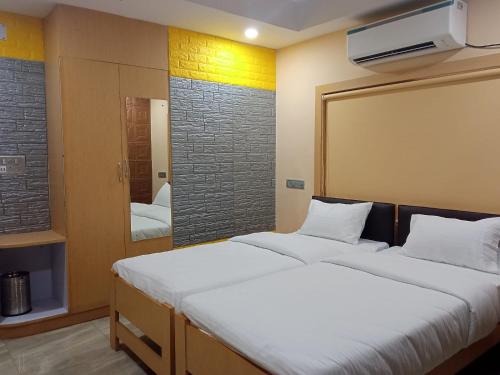 Soukyam Hotel ( A Unit of Gomukhi Construction Pvt Ltd)