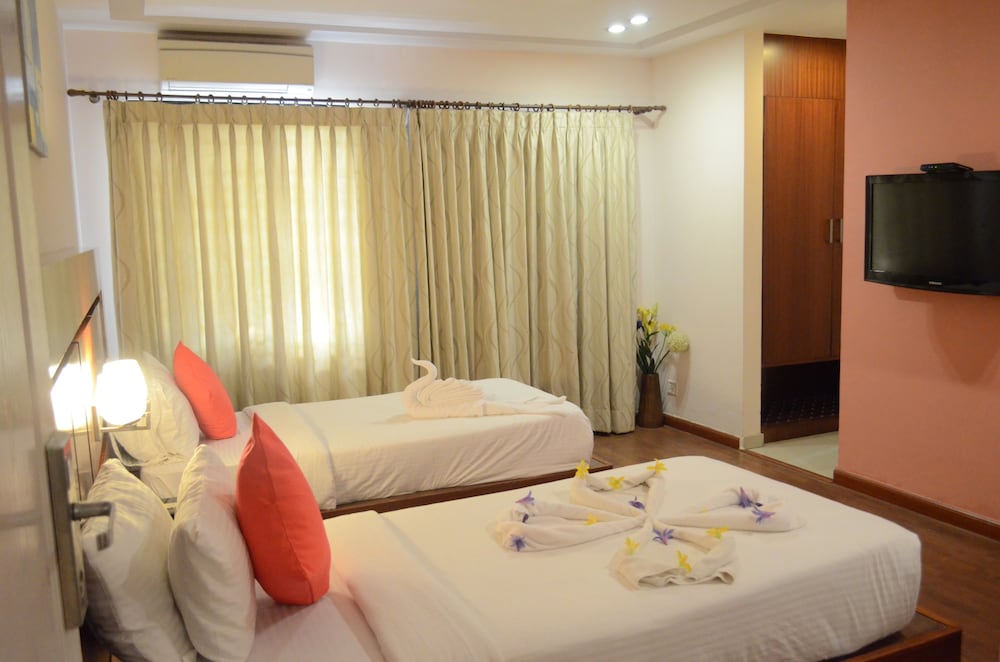 Capital O 5829 Gardeenia Comforts Suites
