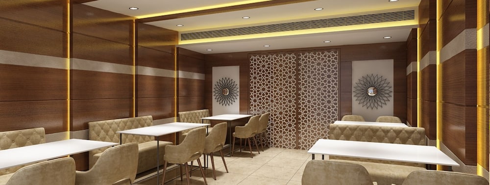 Grand FFOUR near Nehru Place