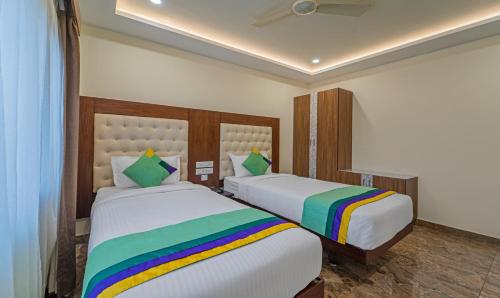Treebo Aaravi Residency, 800 Mtrs From Promenade Beach